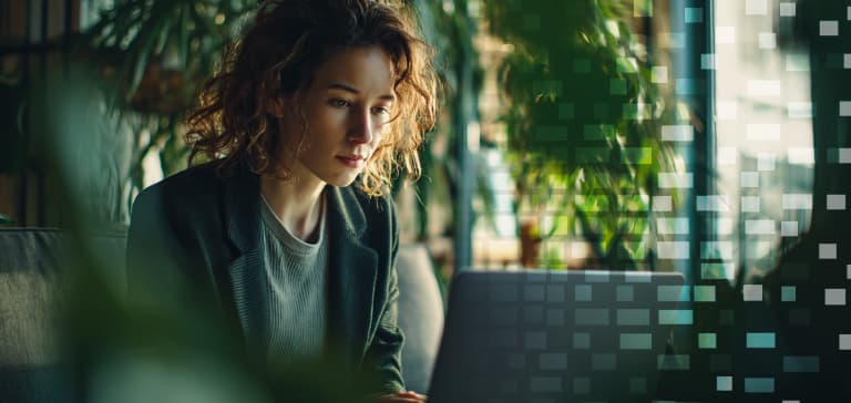 Entrepreneur focused on laptop at Vibe Bootcamp